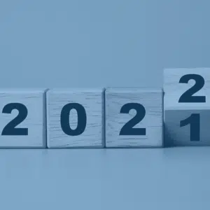 Numbered wooden blocks changing from the year 2021 to 2022.